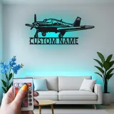 Décoration murale en métal personnalisée avec lumière LED d'avion - Cadeau d'aviation pour pilotes, décoration de hangar ou de bureau