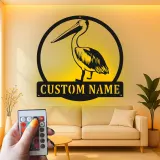 Cartel de metal LED personalizado de pelícano para regalo costero y decoración de casa de playa