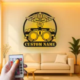 Panneau Optométriste Personnalisé | Décoration murale en métal Phoroptère | Décor de bureau d'ophtalmologiste avec lumière LED | Cadeau logo Caduceus